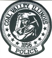A photo of Coal Valley's police badge